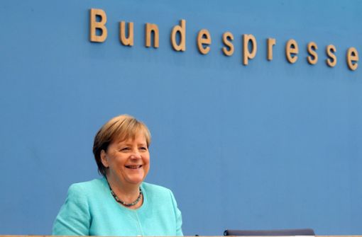Angela Merkel gut gelaunt bei ihrem letzten Auftritt in der Bundespressekonferenz, dem Verein der Berliner Hauptstadtjournalisten Foto: dpa/Wolfgang Kumm