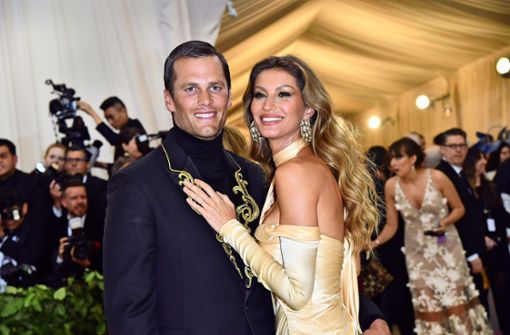 Gisele Bündchen und ihr Mann Tom Brady im Jahr 2018 bei der Met-Gala. Foto: AFP/Angela Weiss