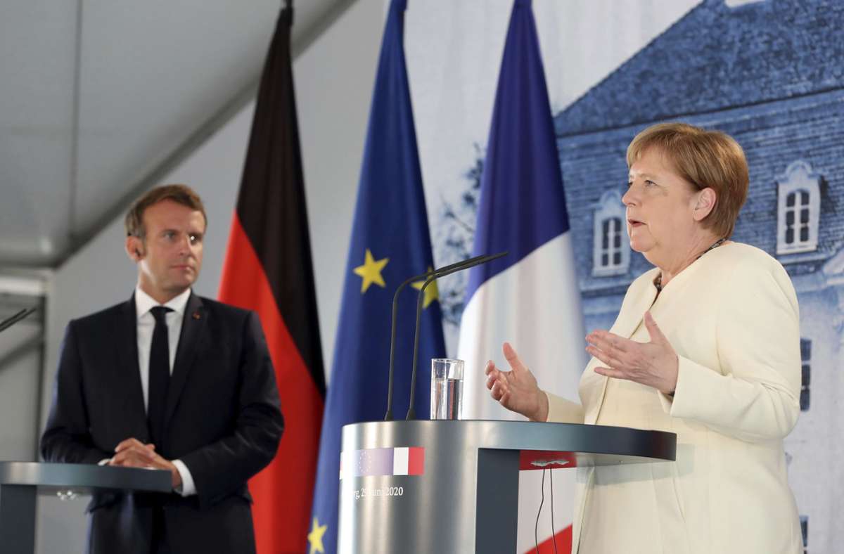 Französischen Präsident in Deutschland: Merkel und Macron demonstrieren Einigkeit bei Krisenbewältigung
