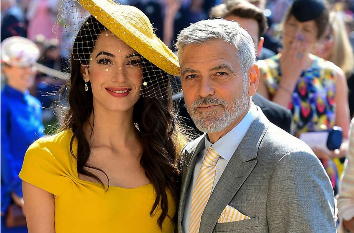 Mit seiner schönen und blitzgescheiten Frau Amal ist George Clooney auf dem gesellschaftlichen Parkett zu Hause: Zum Beispiel 2018 bei der Hochzeit von Meghan Markle und Prinz Harry.