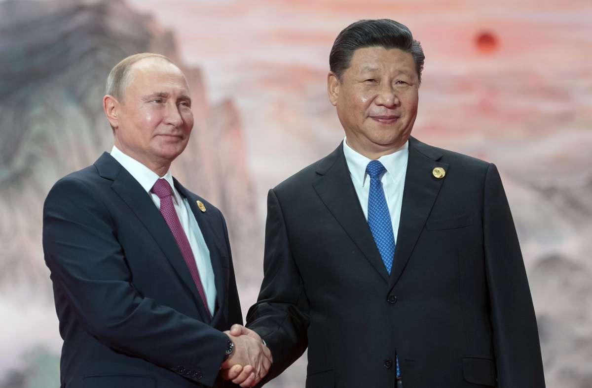 Putin und Xi, mächtige Männer (Archivbild) Foto: AFP/SERGEY GUNEYEV