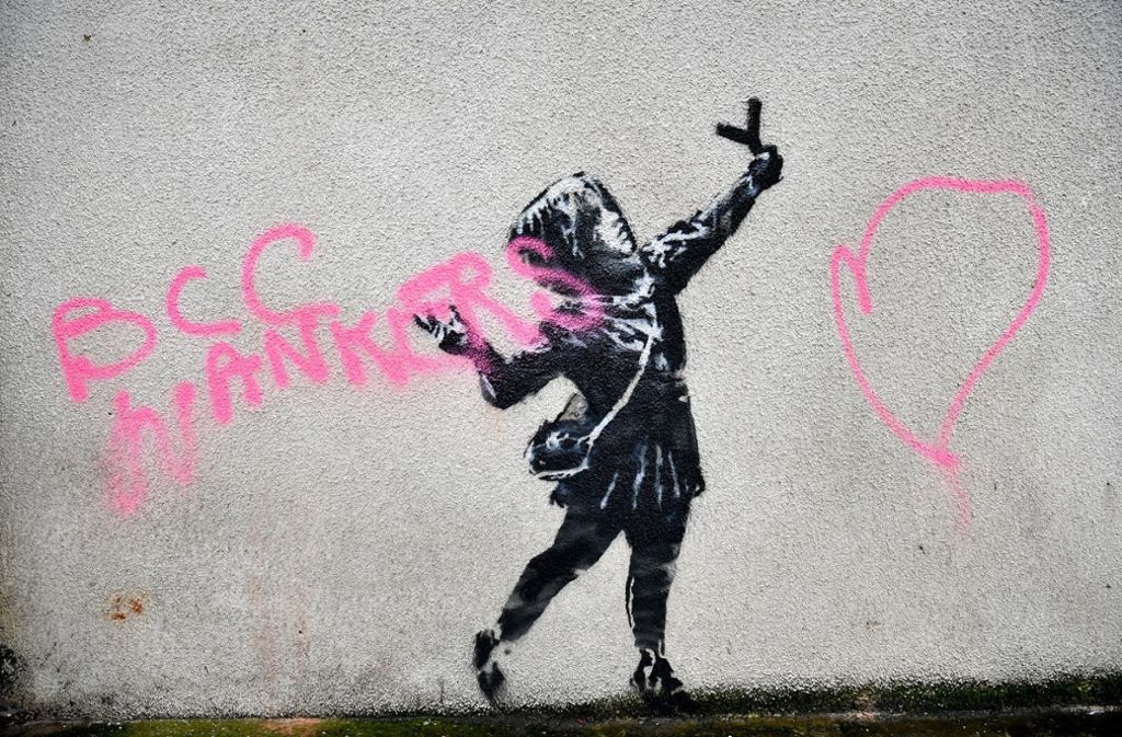 Unbekannte besprühten das Werk von Banksy. Foto: dpa/Ben Birchall