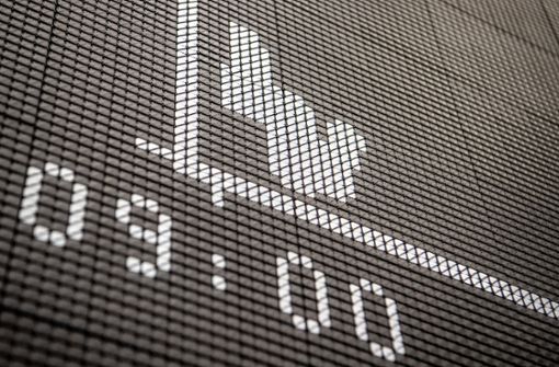 Der Deutsche Aktien Index (DAX) war zum Handelsstart unter die 10.000-Punkte-Marke gerutscht Foto: dpa/Boris Roessler