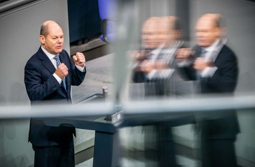 Finanzminister Olaf Scholz kämpft im Bundestag für seinen Etat. Foto: dpa