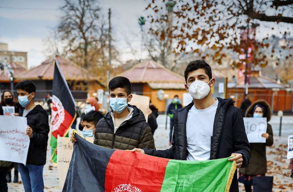 Afghanen machen auf die Lage in ihrer Heimat aufmerksam. Foto: Lichtgut/Julian Rettig