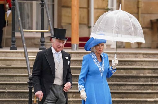 Prinz Charles und seine Frau, Herzogin Camilla, bei einer Gartenparty im Buckingham Palace. Foto: AFP/JONATHAN BRADY