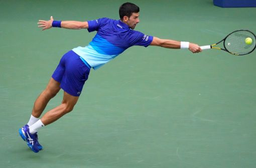 Novak Djokovic hat sich vergeblich nach dem Grand Slam gestreckt. Foto: AFP/TIMOTHY A. CLARY